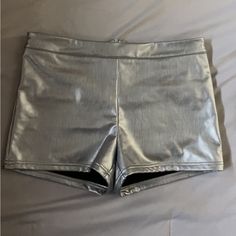 Brand New Silver Pleather Shorts, Never Worn No Stains Or Rips. Fitted Faux Leather Shorts For Summer, Fitted Faux Leather Summer Bottoms, Spring Faux Leather Bottoms With Built-in Shorts, Faux Leather Bottoms With Built-in Shorts For Night Out, Trendy Faux Leather Bottoms For Summer, Party Faux Leather Shorts, Trendy Faux Leather Summer Shorts, Chic Metallic Shorts, Metallic Short Bottoms For Night Out