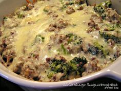 a casserole dish with meat and broccoli in it