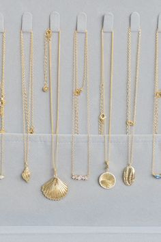 Shop Coast + Cove Co for coastal inspired, modern gold jewelry. Coast + Cove's jewelry collections feature earrings, bracelets, and unique necklace styles. Discover the latest collection of stone bead necklaces or explore a wide selection of bracelet stack ideas. Ocean-inspired 14k Gold Jewelry, Elegant Beach Jewelry With Pearl Pendant, Ocean-inspired Gold Round Pendant Jewelry, Gold Ocean-inspired Round Pendant Jewelry, Gold Ocean-inspired Charm Necklaces As Gift, Gold Ocean-inspired Charm Necklace For Gift, Ocean-inspired Gold Charm Necklace For Gift, Elegant Pendant Necklaces For The Beach, Elegant Gold Shell Necklace With Clavicle Chain