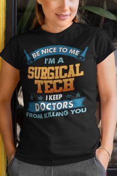 a woman wearing a black t - shirt that says be nice to me i'm a surgical tech keep doctors from killing you