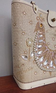 Rare Enid Collins Fine Feathers Peacock Bird Jeweled Handbag Purse | eBay Designer Handmade Shoulder Bag For Shopping, Designer Embellished Rectangular Shoulder Bag, Beige Embellished Rectangular Shoulder Bag, Designer Handmade Top Handle Shoulder Bag, Designer Handwoven Beige Bag, Designer Beige Handwoven Bag, Luxury Embellished Tote Bag, Beige Embellished Rectangular Bag, Elegant Handwoven Shoulder Bag