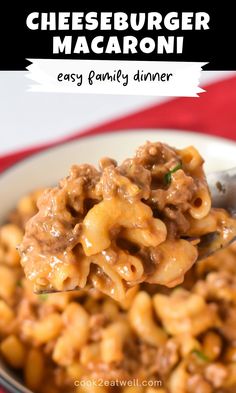 a spoon full of cheeseburger macaroni on a plate