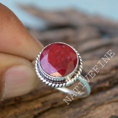 Ruby Gemstone Ring, Bezel Setting Statement Ring, 925 Sterling Silver Ring, Round Faceted Red Ruby Gemstone Ring ,Designer Gift Ring- Native-02 Ruby is a red variety of corundum, an aluminum oxide with a hardness of 9. Its crystal system is hexagonal (trigonal). It forms in prismatic, tabular, bipyramidal or rhombohedral crystals. It also occurs in granular or massive habits. It is an extremely hard and durable gemstone. Meaning: Ruby means 'red gemstone'. The name originated from French and Eng Red Ruby Ring With Bezel Setting For Promise, Red Ruby Promise Ring With Bezel Setting, Ruby Birthstone Ring With Gemstone Detail, Red Round Stone Birthstone Jewelry, Ruby Ring With Round Stone, Red Birthstone Round Stone Jewelry, Red Ruby Birthstone Ring, Red Round Birthstone Jewelry, Fine Jewelry Ruby Ring With Stone Setting