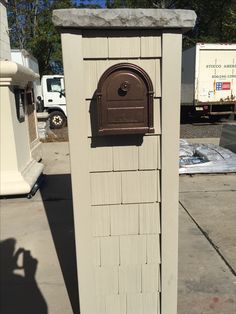 a mailbox on the side of a building