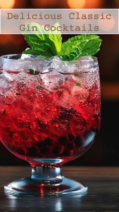 a close up of a drink in a glass on a table with the words delicious classic gin cocktails