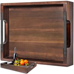 a wooden serving tray with wine and fruit on the side, next to it's bottle opener