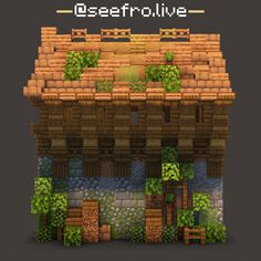 an old house made out of blocks and bricks with plants growing on the top of it