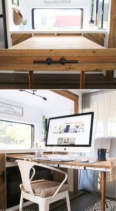 a desk with a computer on it in front of a window