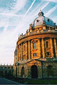 an old building with a dome on the top and sky in the backgroud