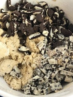 a bowl filled with cookies and chocolate chips