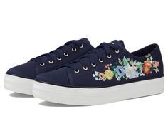 Keds Keds X Rifle Paper Triple Kick Vintage Blossom - Women's Shoes : Navy : Outshine all your casual looks by pairing the Keds Keds X Rifle Paper Triple Kick Vintage Blossom Shoes with your favorite apparels. The shoes come with a textile upper, lining, and insole which provides lasting durability. The floral detailing on the sides gives the vintage shoes an instant touch of style. The round toe shape and lace-up closure gives you the perfect fit. Signature branding on tongue and heel. Syntheti Textile Low-top Sneakers With Floral Print, Floral Print Textile Low-top Sneakers, Floral Print Textile Lace-up Sneakers, Floral Print Textile Sneakers For Spring, Spring Textile Flat Sneakers, Spring Canvas Shoes With Cushioned Footbed, Spring Textile Canvas Shoes With Rubber Sole, Mandala Dotting, Keds Shoes