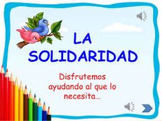 a sign that says la solidaridad with colored pencils in front of it