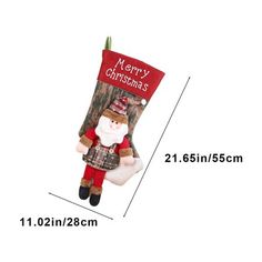 a christmas stocking hanging from the side of a tree with santa claus on it