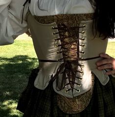 This is a great 18th century corset and stomacher, fully lined with boning in front, sides, and back. It's longer wasted so no muffin top and laces at the shoulders for a better fit. All of our corsets are made to really cinch you in so they have layers of fabric interfacing and busk to give great support. It laces up the front with grommets and is made to your measurements. This listing is only for the corset, a perfect corset for a pirate or a peasant. At time of purchase we can discuss the co 18th Century Stays, Royalty Core, Pirate Photo, Ren Faire Costume, Late Middle Ages, Pirate Costume, Pirate Theme, Find Color, Masquerade Ball