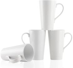 three white coffee mugs stacked on top of each other