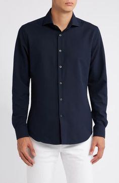 A handsome shade of navy blue colors this staple shirt designed with a neat spread collar. Front button closure Spread collar Long sleeves with button cuffs 100% polyester Machine wash, line dry Imported Navy Collared Slim Fit Shirt, Navy Slim Fit Collared Shirt, Navy Button-up Shirt For Semi-formal Occasions, Casual Navy Dress Shirt For Work, Navy Business Top With Spread Collar, Navy Formal Tops With Button Closure, Navy Tops With Button Closure For Business Casual, Navy Tops With Button Closure For Formal Occasions, Classic Navy Shirt With Button Closure