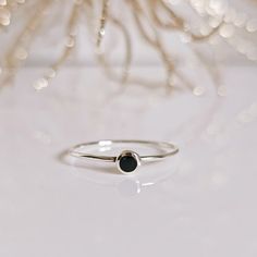 Top Of Ring Height: 4.1 Mm Band Width: 0.9 Mm Center Stone Size: 2.8 Mm Stone: Black Onyx Stone Shape: Round Total Number Of Stones: 1 Metal: 925 Sterling Silver Finish: High Polish 925 Stamped K E E P I N T O U Ch Https://Instagram.Com/Emmaverajewelry Https://Www.Facebook.Com/Emmaveradesign Thank You For Visiting My Shop Minimalist Black Stackable Rings With Round Band, Minimalist Round Stackable Rings As Gift, Minimalist Stackable Black Rings, Minimalist Stackable Rings As Gift, Black Minimalist Stackable Rings, Minimalist Black Stackable Rings, Minimalist Nickel Free Round Band Ring, Minimalist Sterling Silver Midi Rings With Birthstone, Minimalist Nickel-free Round Band Ring