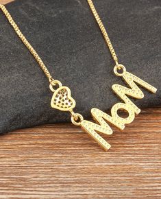 24k gold filled necklace - 17.7” 24k gold filled pave pendant Follow us on Instagram:https://www.instagram.com/livinfearlesscollection Gold Clavicle Charm Necklace For Mom, Gold Clavicle Chain Charm Necklace For Mom, Mother's Day 14k Gold-filled Gold Necklaces, 14k Gold Filled Necklaces For Mother's Day, 14k Gold Filled Necklaces - Gift For Mom, Gold Filled Necklace, Pave Pendant, Follow Us, Ring Earrings