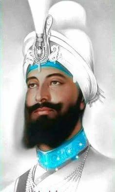 an image of a man with a beard wearing a turban and blue sash