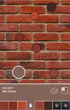 a brick wall with different colors and shapes