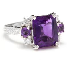 4.70 Carats Natural Amethyst and Diamond 14K Solid White Gold Ring Suggested Replacement Value: Approx. $5,800.00 Total Natural Amethyst Weight is: Approx. 4.40 Carats Center Emerald Cut Amethyst Weight is: Approx. 4.00 Carats Center Amethyst Measures: Approx. 11.00mm x 9.00mm Natural Round Diamonds Weight: Approx. 0.30 Carats (color G-H / Clarity SI1-SI2) Ring total weight: Approx. 7.3 grams Disclaimer: all weights, measurements and colors are approximate and may vary slightly from the listed d Emerald Cut Aquamarine Ring, Emerald Cut Rings, Halo Setting, Etsy Gold Ring, Amethyst Gem, Purple Band, Peridot Ring, Aquamarine Rings, White Gold Ring