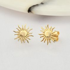 ➤MATERIALS ABOUT EARRINGS Material: 14K Gold, Real Gold. We don't use plated gold or filled gold in our products. Gold Karat: 14 Karat Gold (585). Necklace Colours: 14K Yellow Gold, 14K Rose Gold, 14K White Gold. ★INFORMATION ABOUT EARRINGS Handmade with 14 karat real gold. You can order this earrings with 3 different colour options free express shipping to the all-around the world. ✈ABOUT DELIVERY Your order will be crafted and ready to ship within 1 - 3 business days. If you need to receive yo Sunshine Earrings, Gold Sun Earrings, Sun Earring, Sun Symbol, Tragus Piercing Jewelry, Sun Earrings, Gold Animals, Gold Sun, Jewelry Accessories Ideas