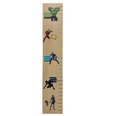 a growth chart with avengers stickers on it