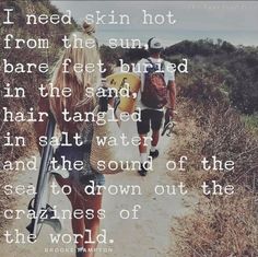 two people walking down a dirt road with a guitar in hand and the words i need skin hot from the sun