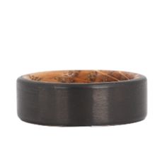 a black ceramic ring with brown wood in it