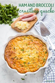 ham and broccoli crustless quiche in a white casserole dish