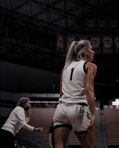 a female basketball player in action on the court