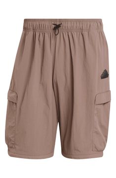 Lightweight and relaxed, these pants made of recycled nylon feature plenty of roomy pockets plus zip-off legs for easy conversion to cargo shorts. 27 1/2" inseam; 20" leg opening; 12 1/2" front rise; 15 1/2" back rise (size Medium) Elastic/drawcord-toggle waist Side-seam pockets; cargo zip envelope-patch pockets Zip-off legs allow an easy transition from pants to shorts as temps change Drawcord-toggle cuffs 100% recycled nylon Machine wash, tumble dry Imported Functional Short Cargo Pants For Hiking, Nylon Athleisure Cargo Shorts, Nylon Athleisure Shorts With Cargo Pockets, Functional Cargo Pants For Summer Outdoor Activities, Functional Summer Cargo Hiking Pants, Functional Summer Hiking Cargo Pants, Functional Summer Cargo Pants For Hiking, Outdoor Relaxed Fit Cargo Pants With Built-in Shorts, Nylon Cargo Pants With Built-in Shorts For Outdoor