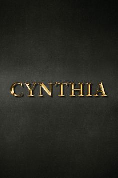 the word cynthia is written in gold on a black background with some type of lettering