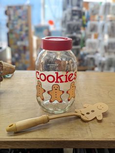 a cookie jar sitting on top of a wooden table