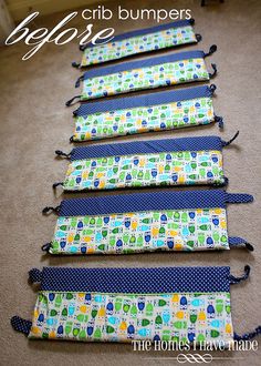 four ties are lined up on the floor