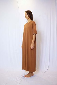 About product    garment dye half sleeve t-shirt maxi dress - this dress features a relaxed t-shirt style with half sleeves a side pocket offering a comfortable and casual look.  crafted from high-quality fabric and garment-dyed to perfection each dress has a unique and slightly lived-in appearance giving it a touch of character and charm.  the soft and breathable material ensures all-day comfort making it ideal for everyday wear.  the maxi length adds a touch of elegance to this laid-back style making it suitable for a variety of occasions.  dress it up with statement accessories and sandals for a bohemian-inspired look or keep it relaxed with sneakers and a denim jacket for a casual day out.  whether you're heading to the beach or meeting up with friends this dress will be your go-to cho T Shirt Maxi Dress, Relaxed Dress, Cotton Jersey Dress, Sustainable Style, Maxi Shirt Dress, T Shirt Style, Fashion Pieces, Wellness Products, Beauty Wellness