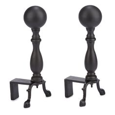 pair of black candlesticks with cast iron bases