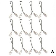 10 pairs of white plastic spoons with silver handles