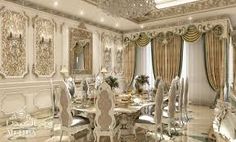 a fancy dining room with chandelier, chairs and table in the middle of it