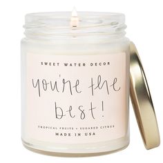 a candle that says, you're the best made in usa with a gold lid