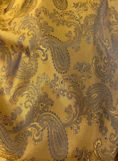 High end quality 140cm wide paisley design lining fabric.Crafted from Viscose and Acetate yarn..This fabric drapes elegantly and boasts a subtle metallic sheen, adding a touch of sophistication to any project. İt's an ideal choice for creating ties and lining garments with style. Why line with plain fabrics when these are available? Fantastic quality Gold/Black two tone paisley design lining fabric. Drapes beautifully and has a metallic sheen. Many colours have a two-tone effect. Made from wood Elegant Jacquard Fabric For Evening, Gold Jacquard Fabric For Formal Occasions, Formal Gold Jacquard Fabric, Elegant Gold Fabric For Formal Occasions, Elegant Gold Brocade Fabric, Elegant Brocade Fabric For Formal Occasions, Gold Elegant Jacquard Fabric, Elegant Gold Jacquard Fabric, Paisley Fabric