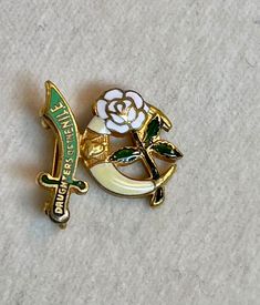 "Antique Gold and Enamel Daughters Of The Nile Pin or Brooch.  Pharaohs Head On Crescent Under a Curved Sword Over a White Rose. Condition: Excellent Antique Condition - Please review all photos as they are part of the description. Measurements: abt 5/8\" X 5/8\" Wonderful Rare Collectible great addition to any collection or as a treasured gift! HISTORY DAUGHTERS OF THE NILE: Daughters of the Nile, founded in 1913, is a benevolent global fraternal organization for women 18 years of age or older, Masonic Jewelry, Reverse Painted Glass, Reverse Painted, The Nile, Gold Gift, Vintage Art Deco, Gold Style, White Rose, White Roses