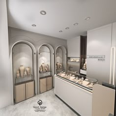 the interior of a jewelry store with white walls