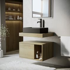 a bathroom with a sink, mirror and towel rack on the wall next to it