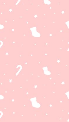 a pink background with white snowflakes, stars and boots in the shape of numbers