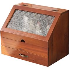 an old wooden box with glass in the top and bottom drawer on it's side