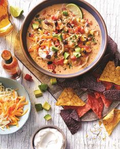 a bowl of mexican soup with tortilla chips