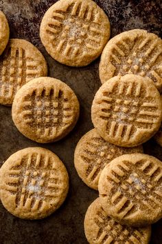 several cookies are arranged on a baking sheet