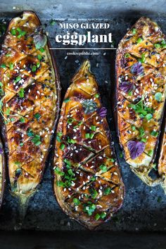 grilled eggplant topped with herbs and seasoning