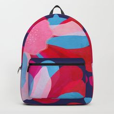 a colorful backpack with an abstract design on it